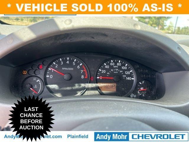 Photo of 2015 Glacier White Nissan Frontier