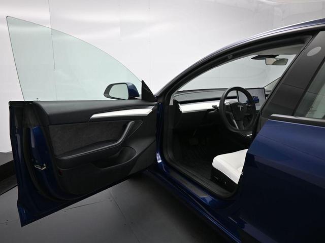 Photo of 2023 Deep Blue Metallic Tesla Model 3