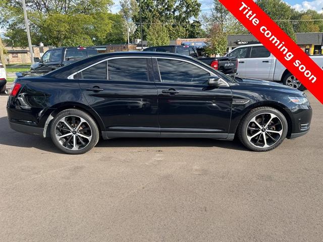 Photo of 2016 Shadow Black Ford Taurus