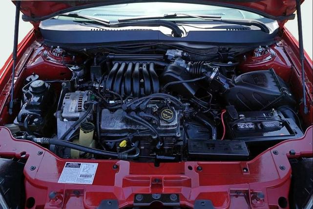 Photo of 2002 Matador Red Clearcoat Metallic Ford Taurus