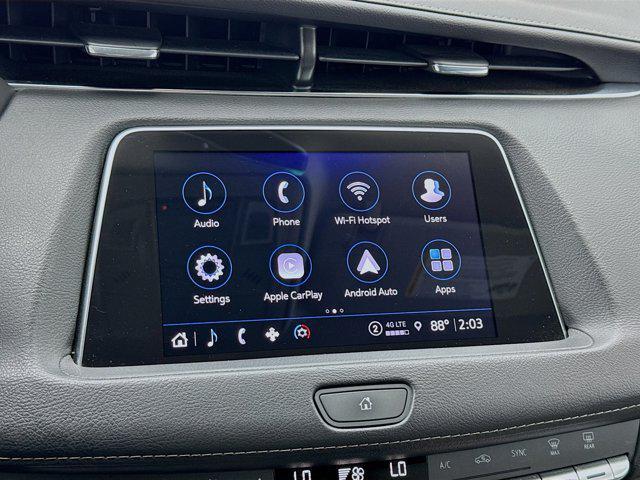 Photo of 2023 Crystal White Tricoat Cadillac XT4