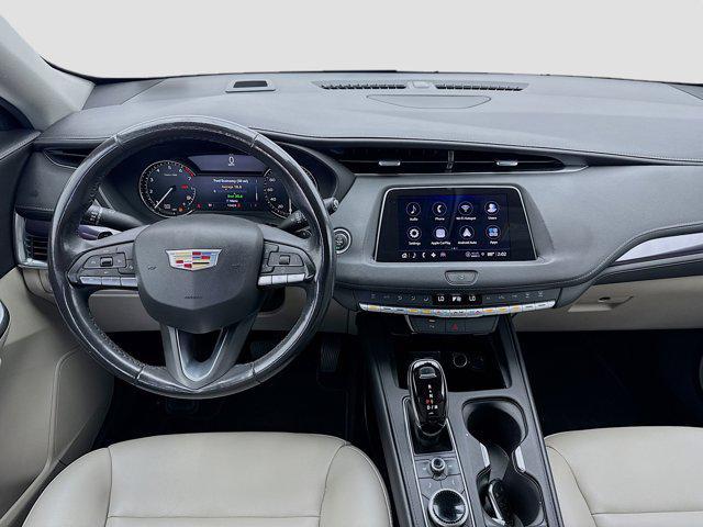 Photo of 2023 Crystal White Tricoat Cadillac XT4