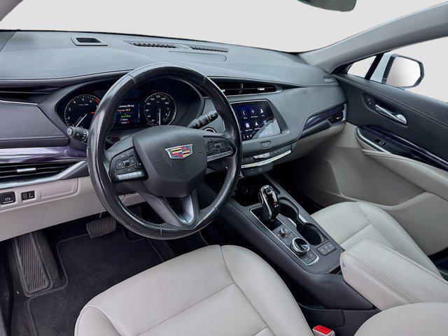 Photo of 2023 Crystal White Tricoat Cadillac XT4