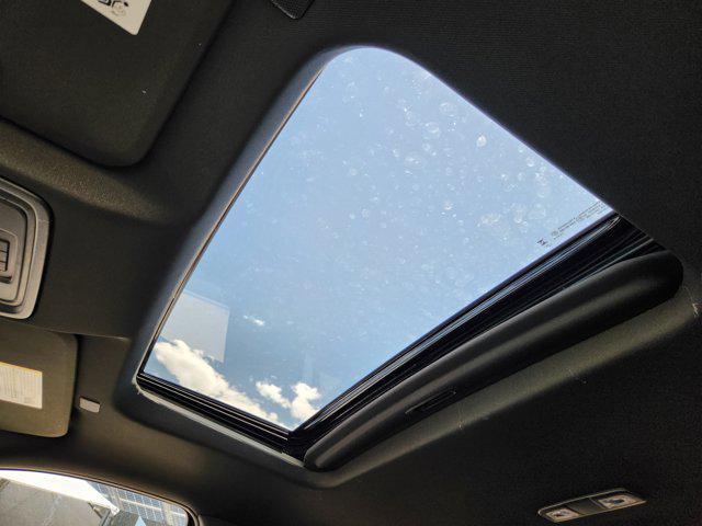 Photo of 2025 Volcanic Red Tintcoat GMC Sierra 2500