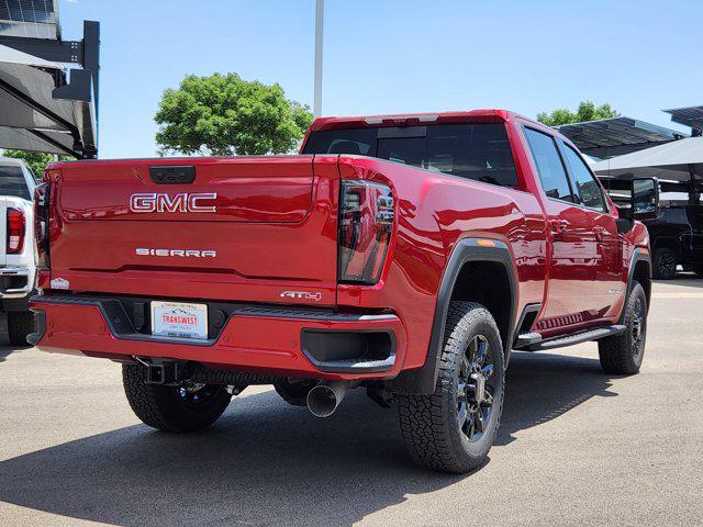 Photo of 2025 Volcanic Red Tintcoat GMC Sierra 2500