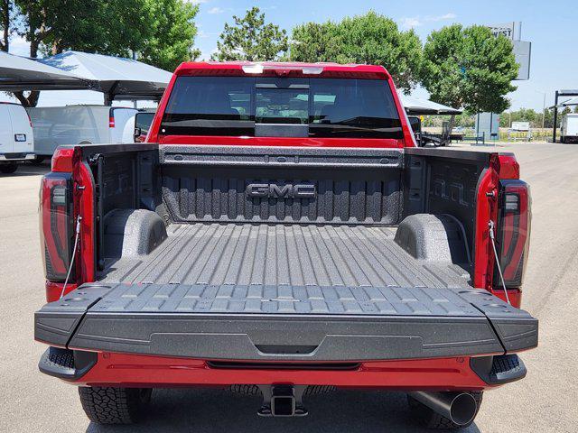 Photo of 2025 Volcanic Red Tintcoat GMC Sierra 2500