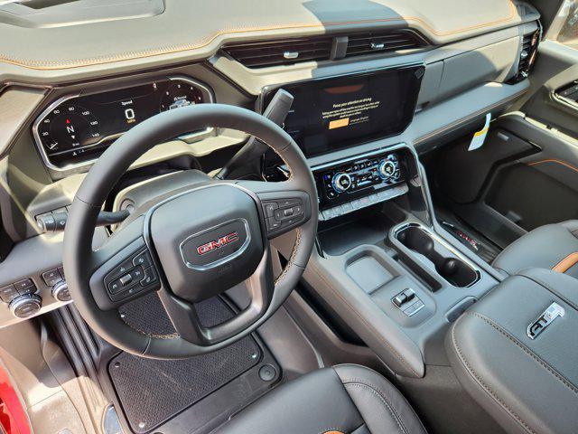 Photo of 2025 Volcanic Red Tintcoat GMC Sierra 2500