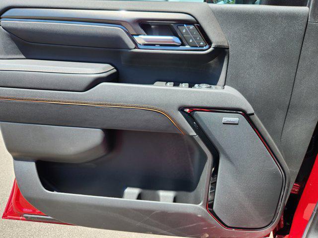 Photo of 2025 Volcanic Red Tintcoat GMC Sierra 2500