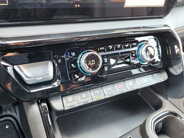 Photo of 2025 Volcanic Red Tintcoat GMC Sierra 2500
