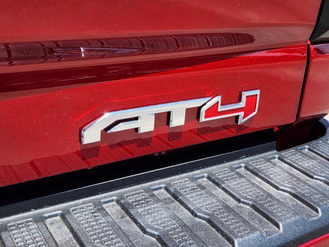 Photo of 2025 Volcanic Red Tintcoat GMC Sierra 2500