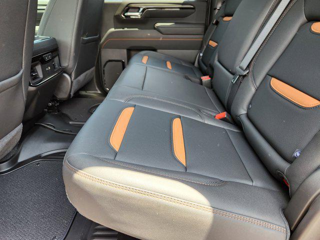 Photo of 2025 Volcanic Red Tintcoat GMC Sierra 2500