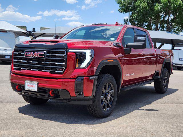 Photo of 2025 Volcanic Red Tintcoat GMC Sierra 2500