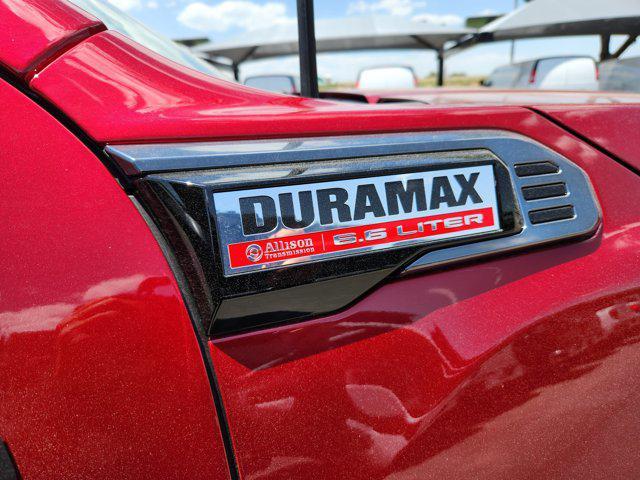 Photo of 2025 Volcanic Red Tintcoat GMC Sierra 2500