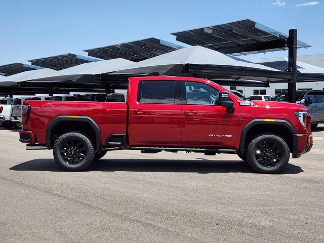 Photo of 2025 Volcanic Red Tintcoat GMC Sierra 2500