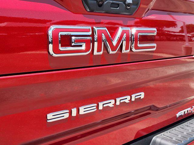 Photo of 2025 Volcanic Red Tintcoat GMC Sierra 2500