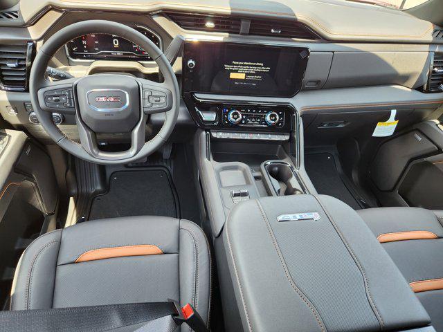 Photo of 2025 Volcanic Red Tintcoat GMC Sierra 2500