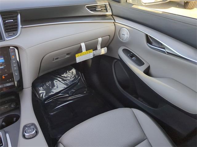 Photo of 2025 White INFINITI QX50