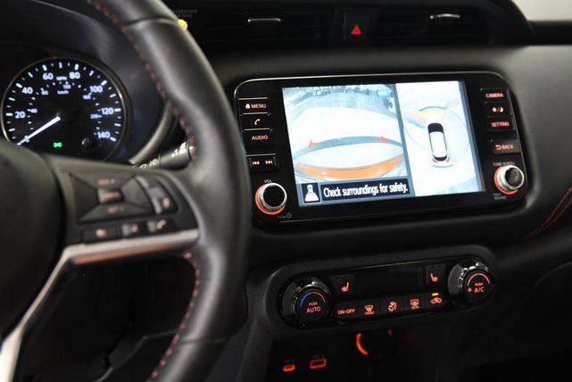 Photo of 2023 Monarch Orange Metallic/Super Black Nissan Kicks