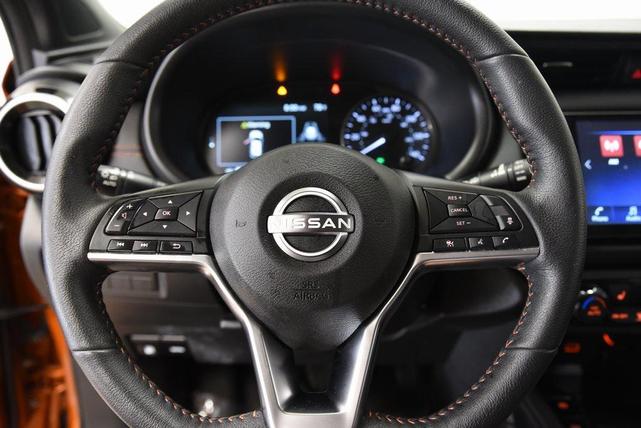 Photo of 2023 Monarch Orange Metallic/Super Black Nissan Kicks