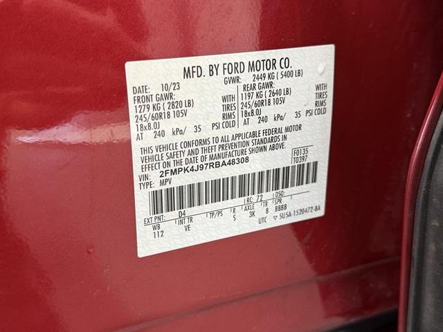 Photo of 2024 Red Metallic Ford Edge