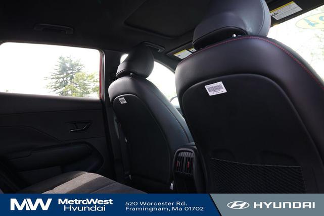 Photo of 2024 Ultimate Red Metallic w/Black Roof Hyundai KONA