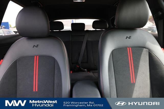 Photo of 2024 Ultimate Red Metallic w/Black Roof Hyundai KONA