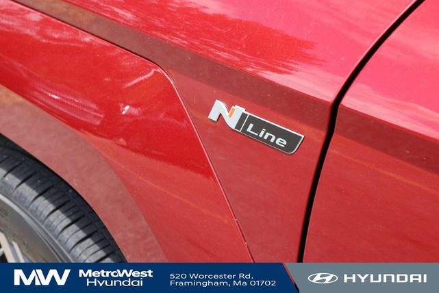 Photo of 2024 Ultimate Red Metallic w/Black Roof Hyundai KONA