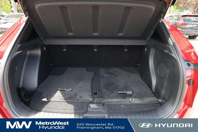 Photo of 2024 Ultimate Red Metallic w/Black Roof Hyundai KONA