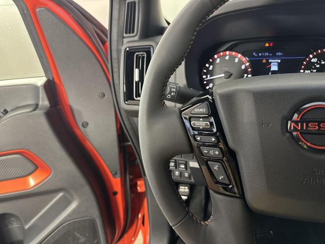 Photo of 2025 Afterburn Orang Nissan Frontier