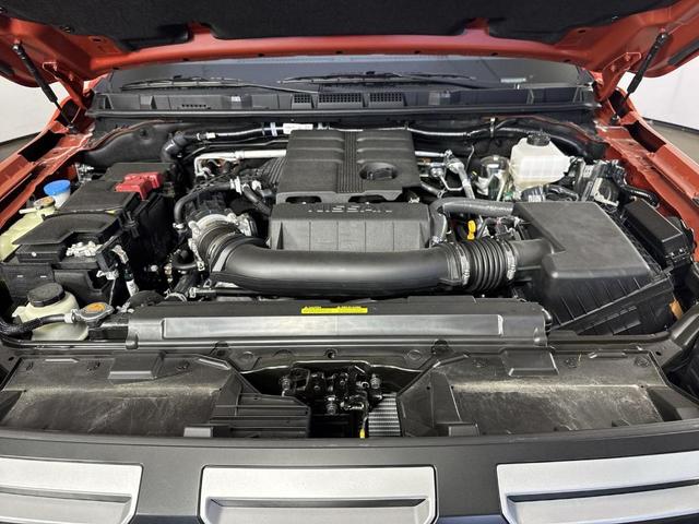Photo of 2025 Afterburn Orang Nissan Frontier