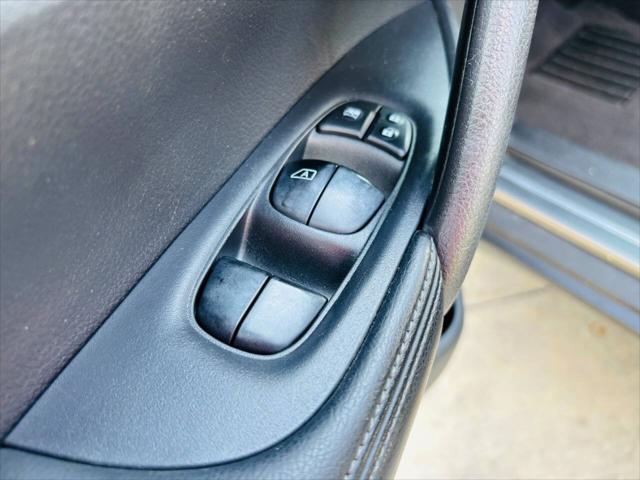Photo of 2015 Gun Metallic Nissan Rogue