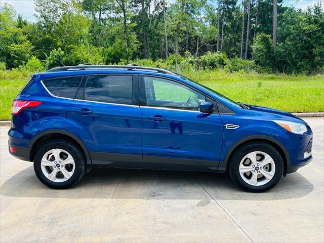 Photo of 2013 Deep Impact Blue Ford Escape