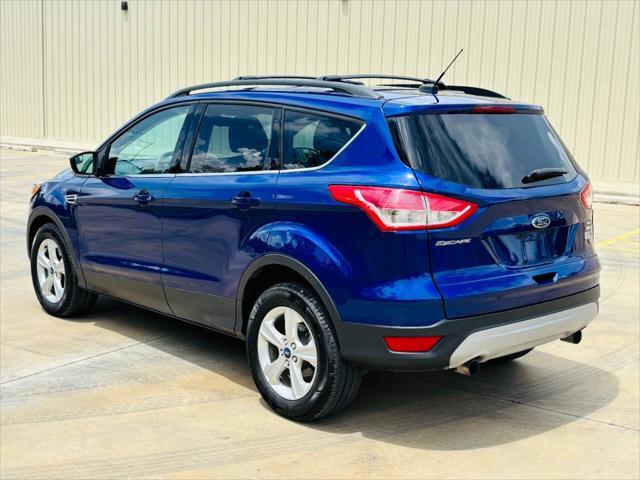 Photo of 2013 Deep Impact Blue Ford Escape
