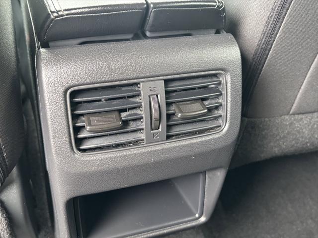 Photo of 2024 Super Black Nissan Rogue
