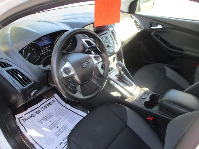 Photo of 2014 OXFORD WHITE Ford Focus