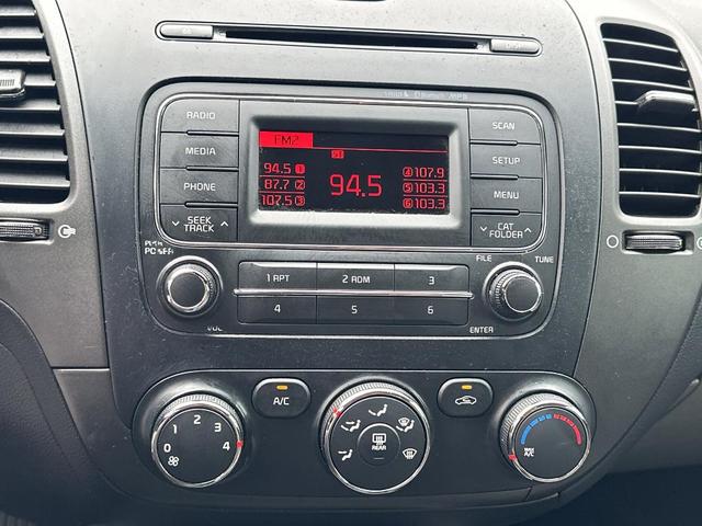 Photo of 2014 Bright Silver Kia Forte
