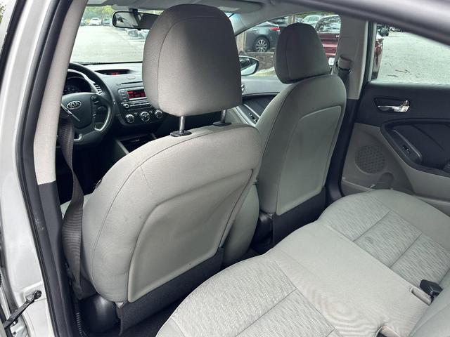 Photo of 2014 Bright Silver Kia Forte