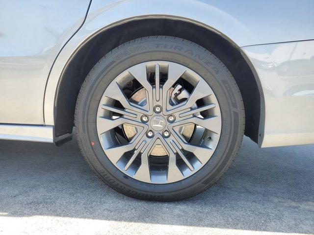 Photo of 2025 Solar Silver Metallic Honda Odyssey