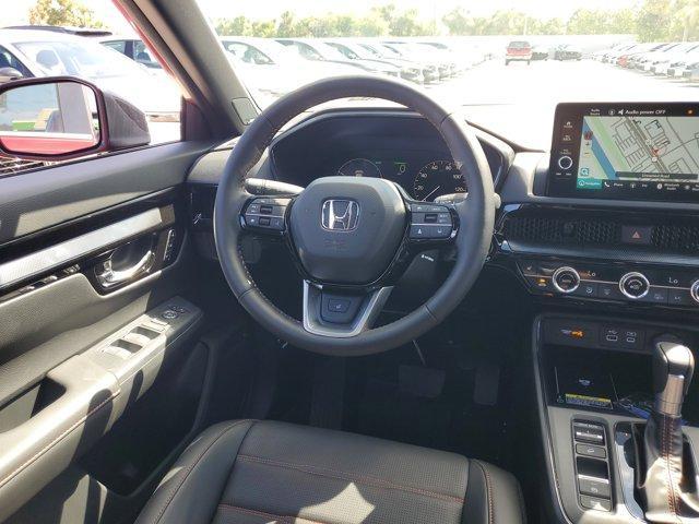 Photo of 2025 Radiant Red Metallic Honda CR-V Hybrid
