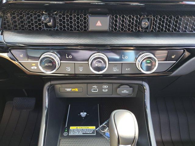 Photo of 2025 Radiant Red Metallic Honda CR-V Hybrid