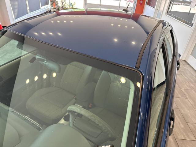 Photo of 2009 Light Ice Blue Clearcoat Metallic Ford Focus