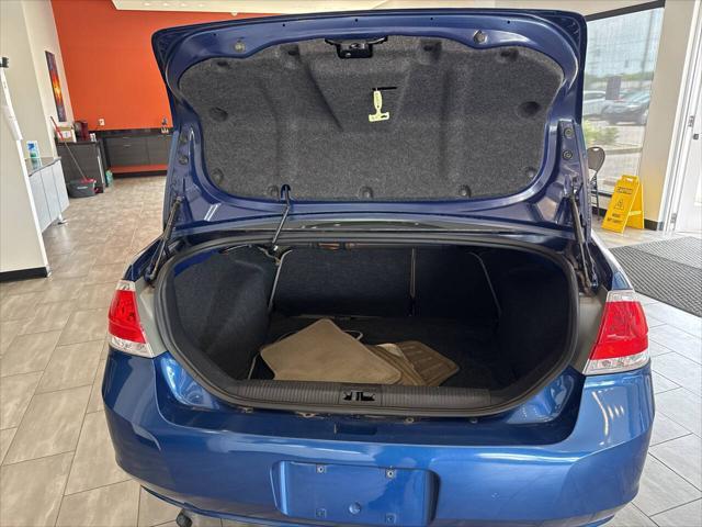 Photo of 2009 Light Ice Blue Clearcoat Metallic Ford Focus