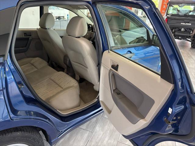Photo of 2009 Light Ice Blue Clearcoat Metallic Ford Focus
