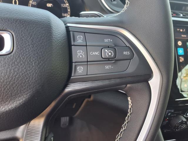 Photo of 2025 Bright White Clearcoat Jeep Grand Cherokee