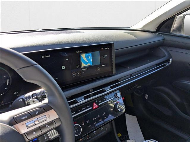 Photo of 2025 Creamy White Pearl Hyundai TUCSON Hybrid