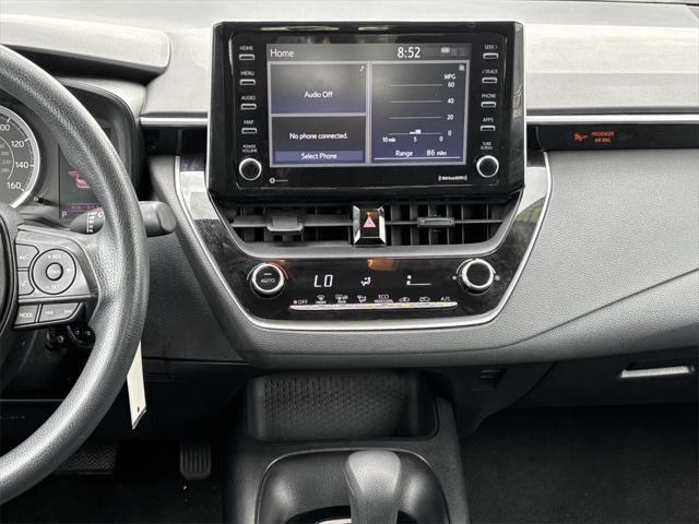 Photo of 2021 Super White Toyota Corolla