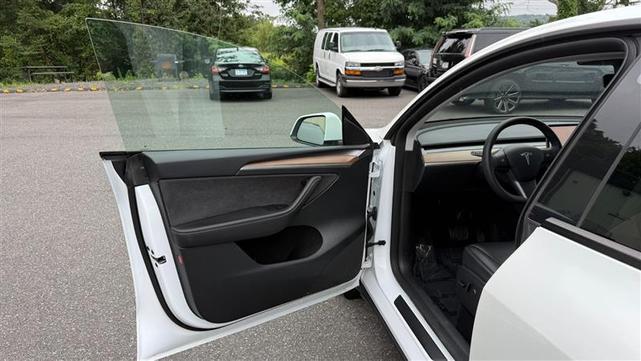 Photo of 2023 Pearl White Multi-Coat Tesla Model Y