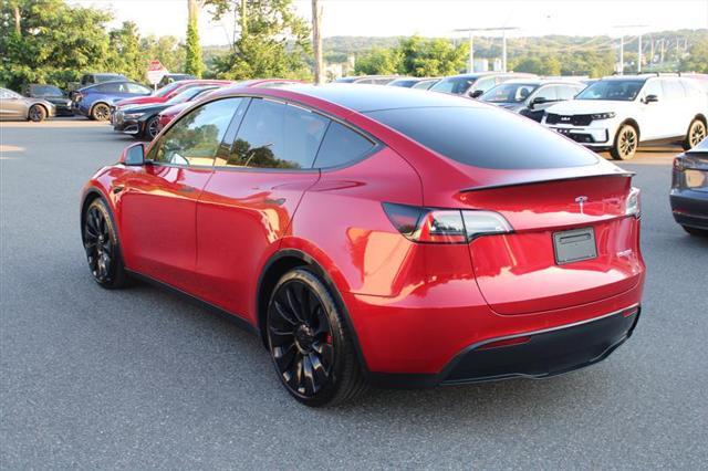 Photo of 2021 Red Multi-Coat Tesla Model Y