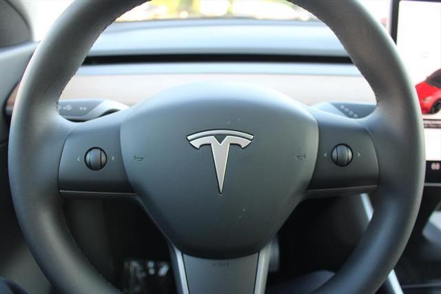 Photo of 2021 Red Multi-Coat Tesla Model Y