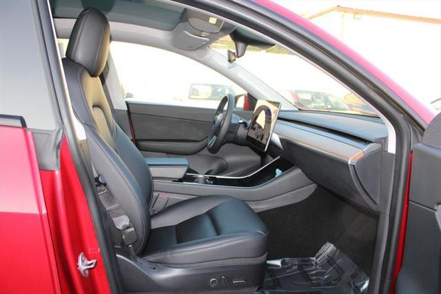 Photo of 2021 Red Multi-Coat Tesla Model Y